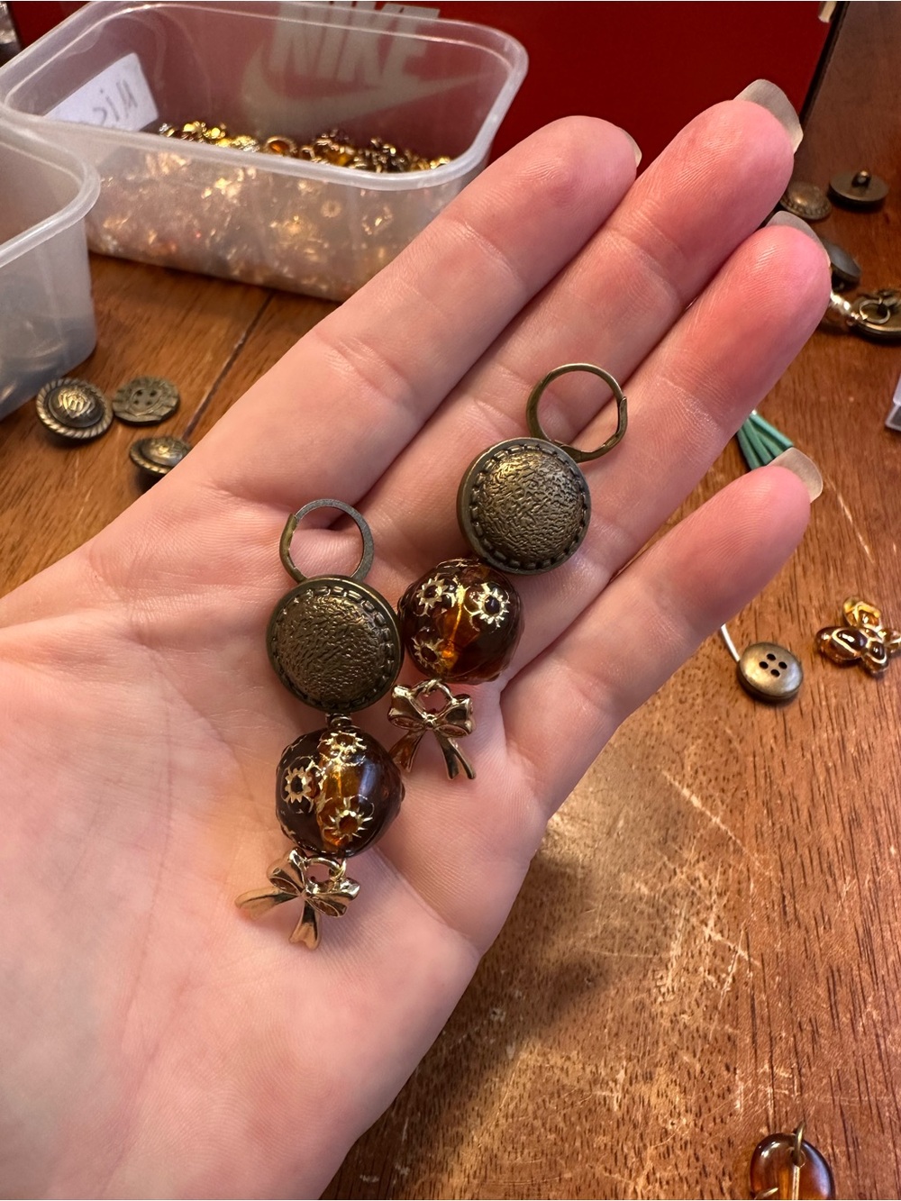 Tortoiseshell Glass Bead Drop Earrings with Antique-Gold Bow Accent